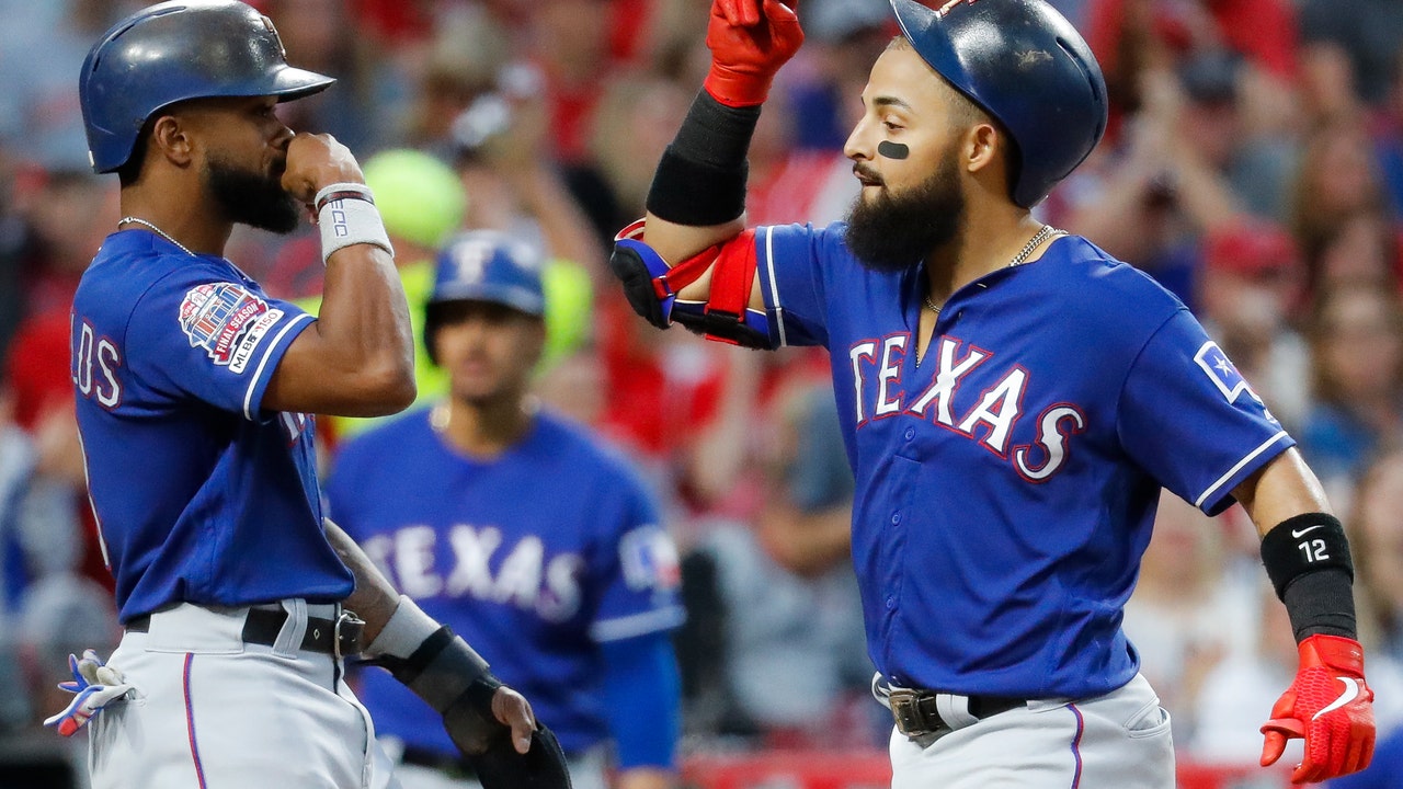 Odor hits grand slam, Rangers' bullpen beats Reds 7-1